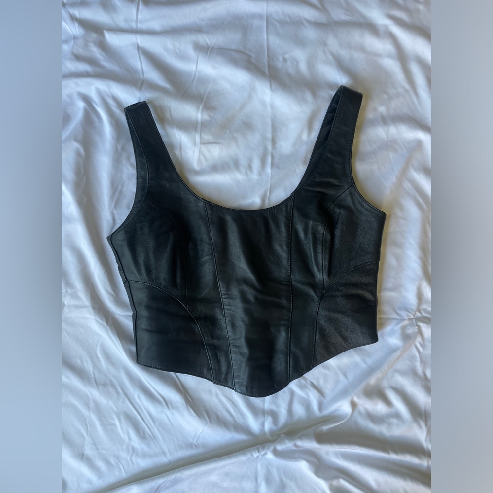 Revolve Understated black leather corset top!